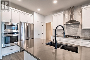 7735 OKANAGAN HILLS Boulevard Unit# 20 - Photo 6