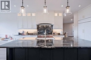 7839 Falcon Ridge Crescent - Photo 6